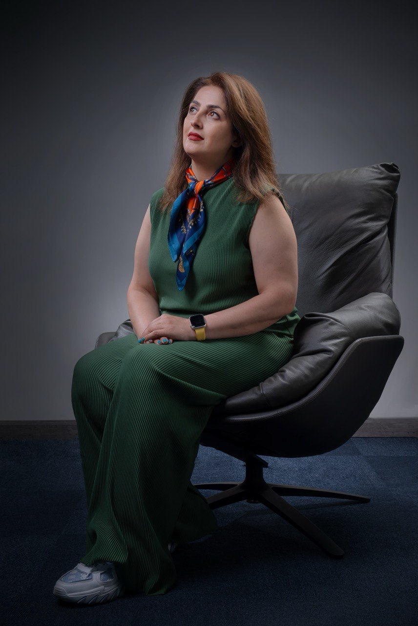 Mahtab Gharakhan seated in the studio — Dubai-based operations leader, strategist, and entrepreneur